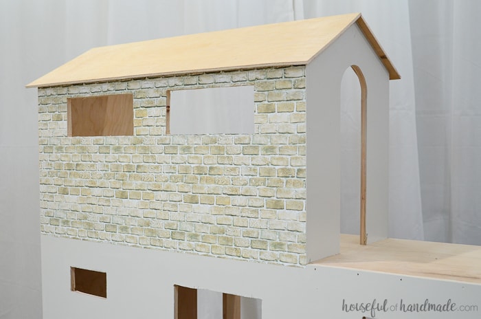 close up of brick on handmade dollhouse