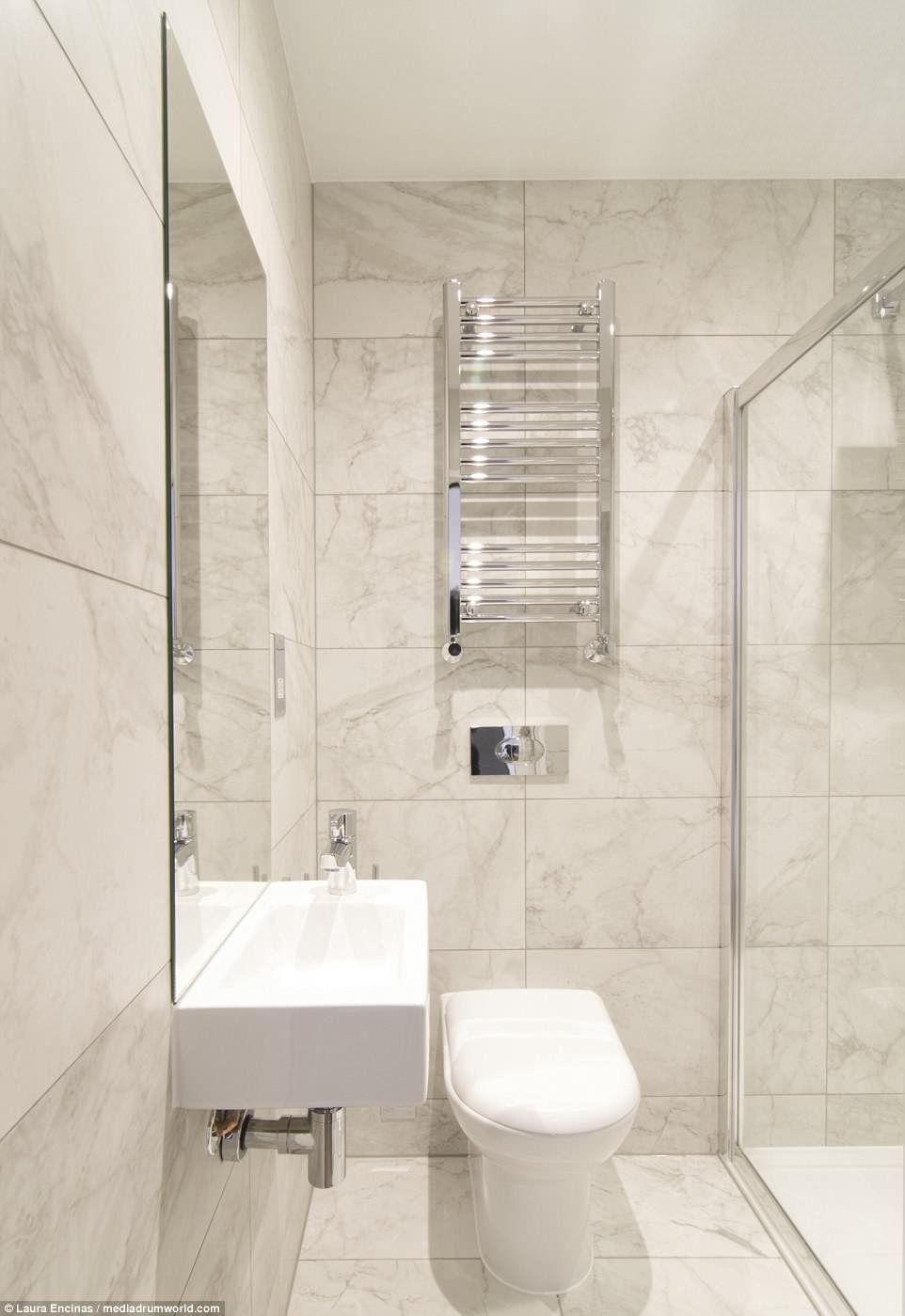 High specification: The porcelain-tiled bathrooms come complete with a walk-in shower, square sink and stainless steel finishing 